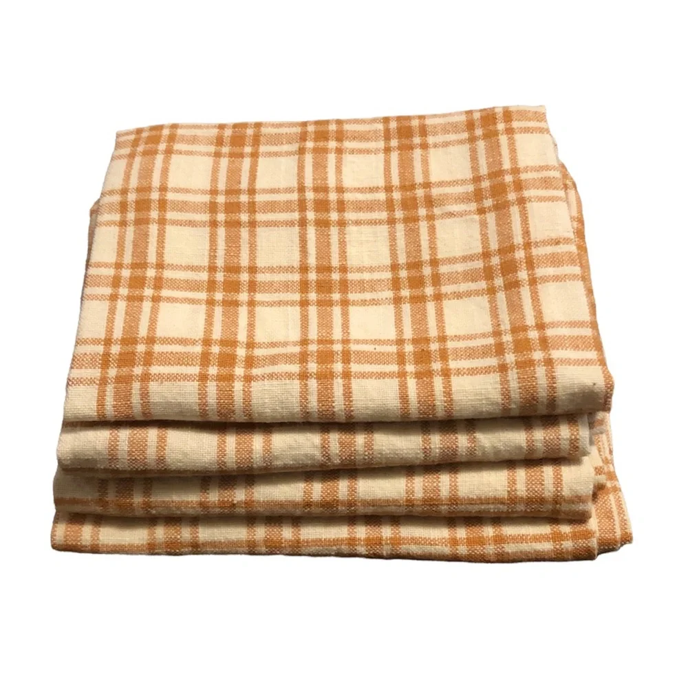 West Elm set of four orange and white checked cloth napkins